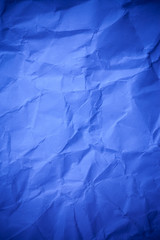 Blue crumpled paper texture background.