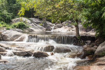 Nine dives waterfall falls from a cliff in the Central Valley Tenasserim mountain range located in Ratchaburi province Thailand. 