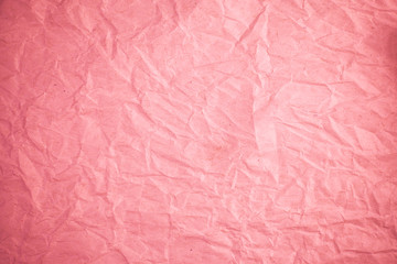 Fototapeta premium Crumpled recycle pink paper background.