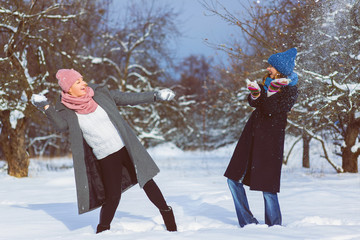 Winter portrait of fashion female friends. Affection and friendship forever Concept
