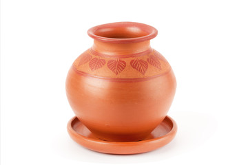 Clay pot and plate .