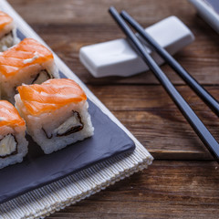 Delicious fresh rolls with salmon closeup