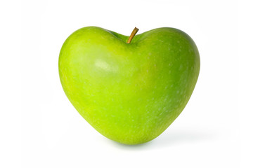 Green apple in the shape of a heart  isolated on white background
