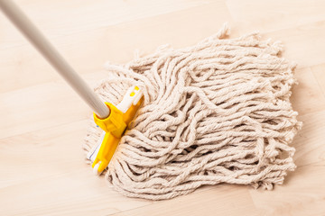 Mop on wooden floor - 133491820