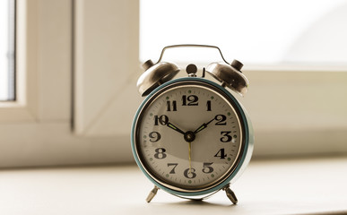 old bracket clock, vintage mechanical USSR alarm clock