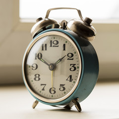 old bracket clock, vintage mechanical USSR alarm clock