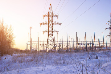 High voltage power lines in the winter. Winter landscape.
