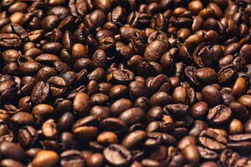 Roasted coffee beans isolated on white background with copy space. Frame for creative concepts or advertising