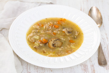 mushroom soup on white plate