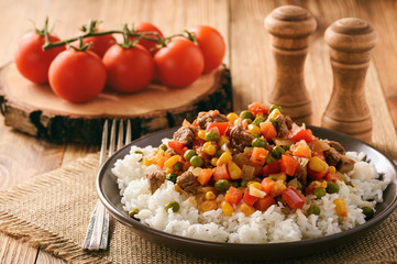 Boiled rice with beef and vegetables.
