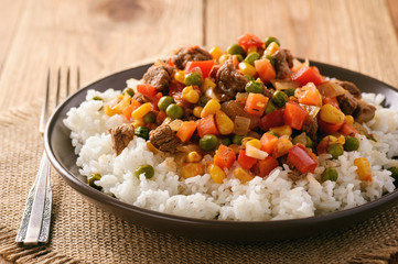 Boiled rice with beef and vegetables.