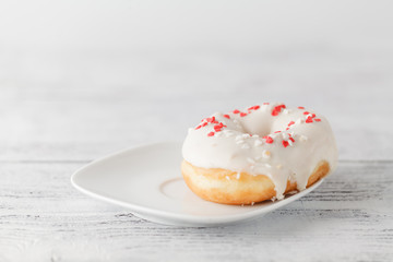 One donut on plate