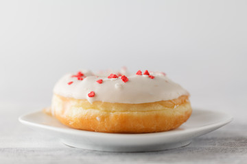 Single elegant donuts on plate