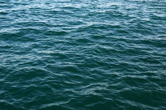 Blue sea surface with waves © Alekss