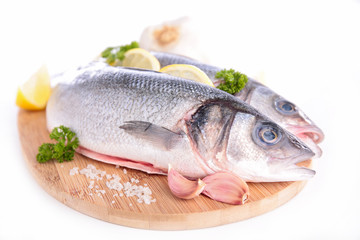 raw fish on board isolated on white