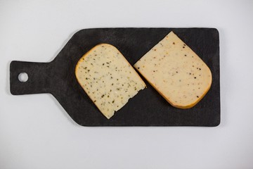 Dutch gouda cheese on chopping board