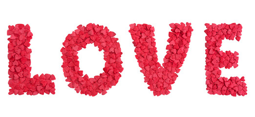 Love word shape from hearts candy sprinkles over white