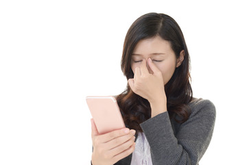 眼精疲労を訴える女性