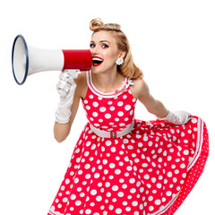 woman holding megaphone, dressed in pin-up style dress