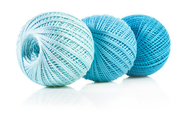 Blue cotton yarn balls isolated on white
