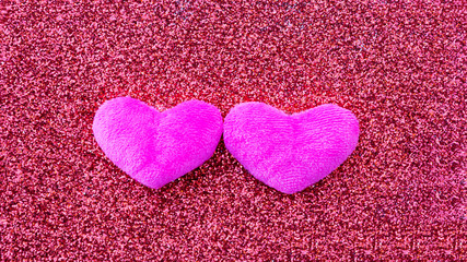 Obraz premium heart on a pink glitter abstracts for a background.