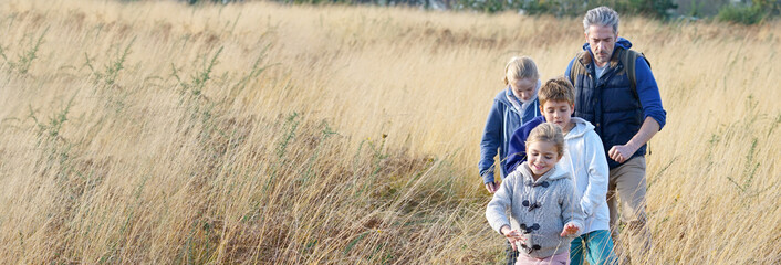 Teacher taking kids to countryside to explore nature © goodluz