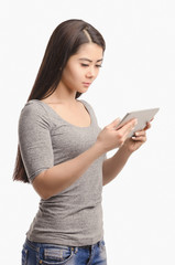 Casual Asian girl with tablet.