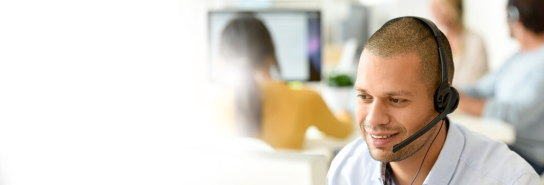 Customer service operator working in office - Powered by Adobe