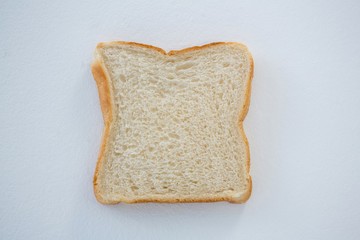 Single bread slice on white background