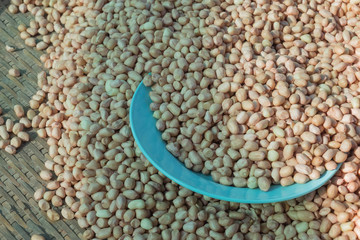 Raw nuts in a wooden basket