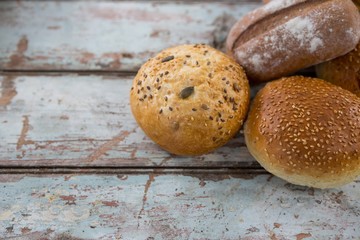 Bread loaves on wooden table