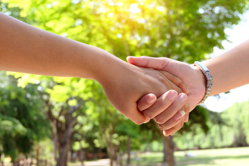 Lovers couple holding hands on valentine day.