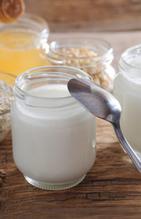 Homemade yogurt with cedar nuts, oatmeal and honey