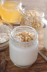 Homemade yogurt with cedar nuts, oatmeal and honey