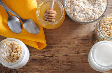 Homemade yogurt with cedar nuts, oatmeal and honey