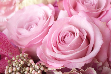 Pink roses in flower arrangement