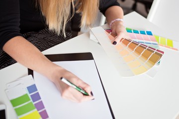 Woman designer or architect choosing color
