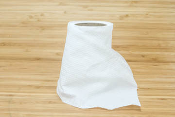 Tissue paper on wooden background
