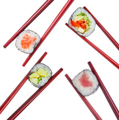 Sushi roll set in wooden red chopsticks isolated on white background