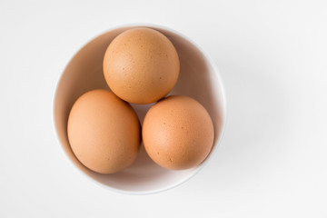 eggs in white cup