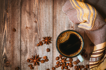 Cup of coffee on rustic wooden background