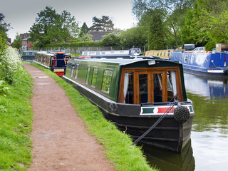 Obraz premium Mooring narrowboats at the towpath side in Penkridge on the Staffordshire and Worcestershire canal