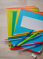 Fototapeta premium Notebooks and pens with pencils