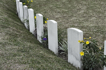 Tombstone and grave in an ancient church graveyard