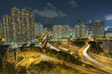 Fototapeta premium Residential buildings and highway in Hong Kong at night