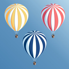 Naklejka premium Set isometric striped hot air balloons flying in the blue sky vector illustration