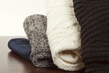 Rolls of warm winter sweaters