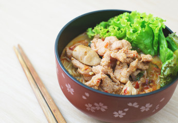 spicy pork noodle, thai style call tomyum