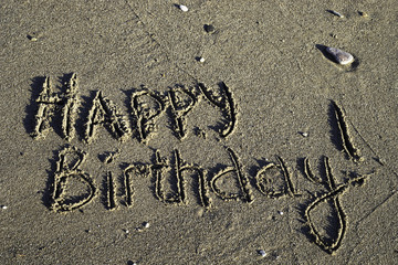 Words on the sand. Happy birthday!
