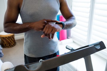 Couple exercising in bedroom
